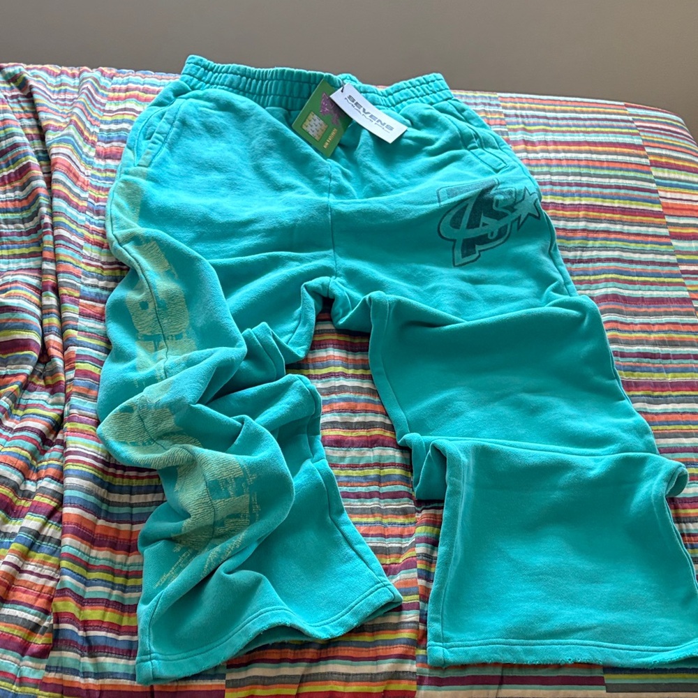 Crazy deals Triple  Sevens Teal Graphic Sweatpants size XL oversized nwt